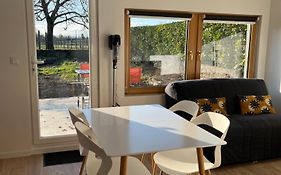Maisonnette avec parking privé et local à velos